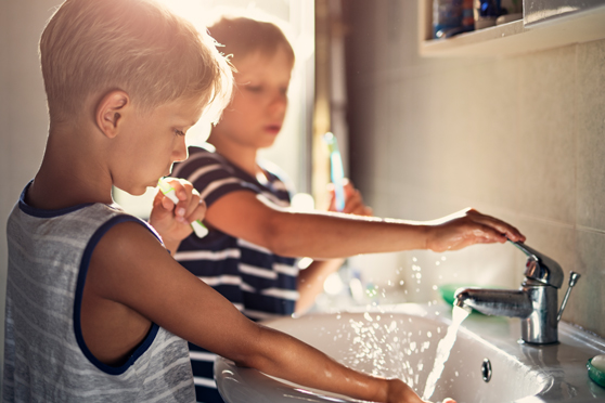 Foundation Little girl writing on a piece of paper